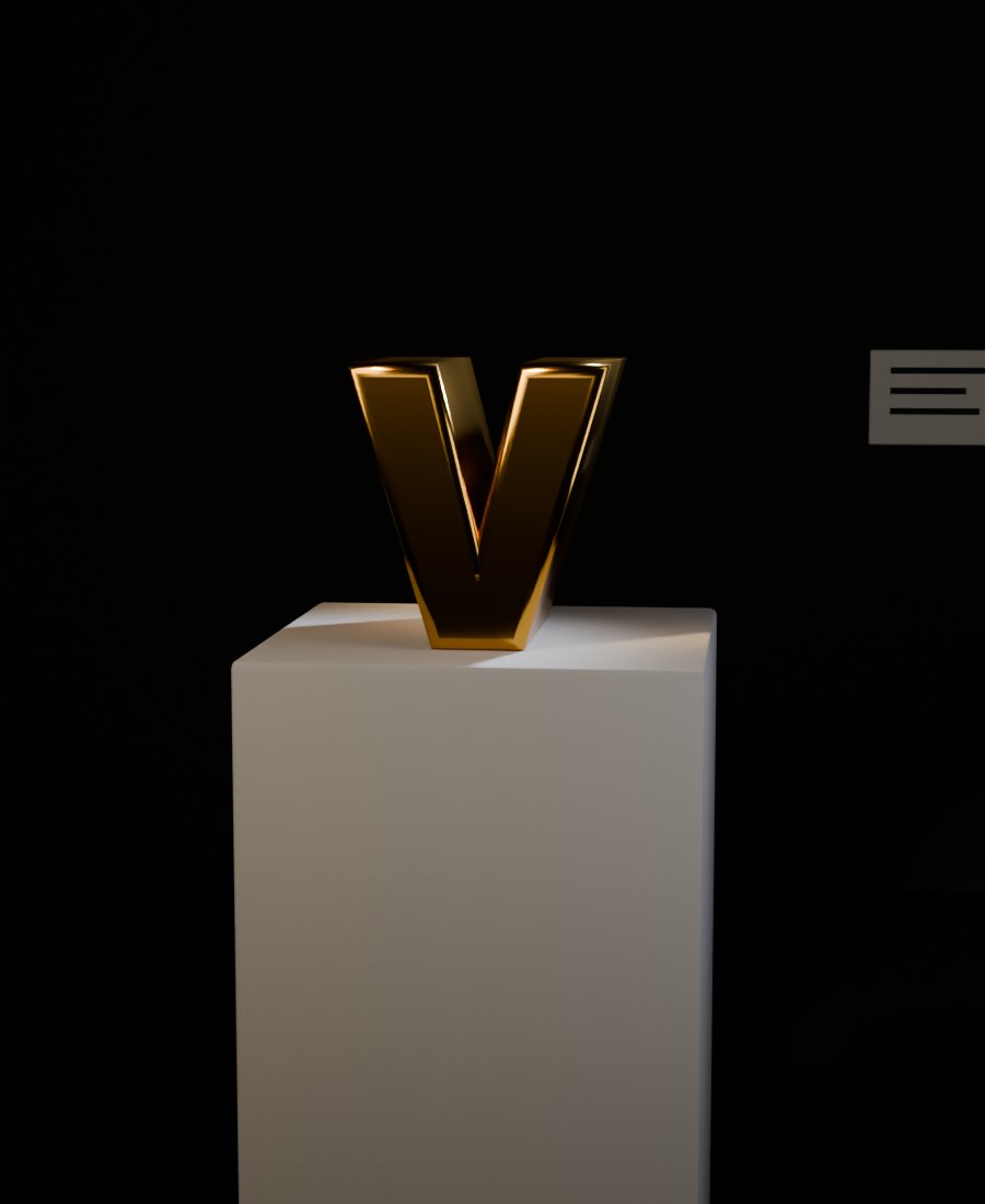 조명 아래 놓인 금빛 V 조각